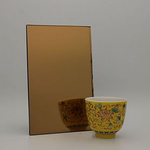 Espejos de bronce dorado